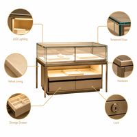 Vitrine d'îlot de luxe en métal pour bijoux, avec éclairage LED et tiroirs de rangement, idéale pour la présentation de montres et de diamants en boutique
