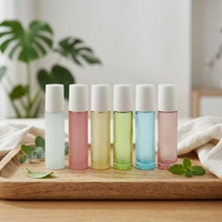 Flacon roll-on de 10 ml en verre ambré de luxe avec bouchon en bambou et logo, pour huile de parfum