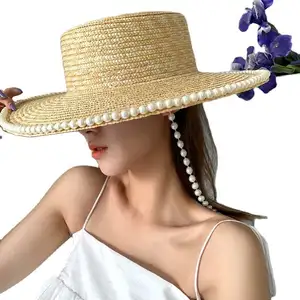 Chapeaux de paille de blé tissés à dessus plat pour femmes, chapeaux de plage, conception de chaîne de perles, chapeau de soleil, vente directe d'usine, nouvelle collection 2023