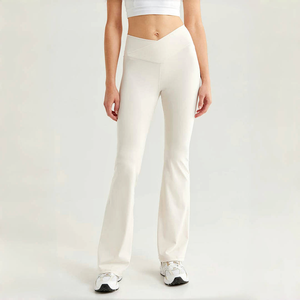 Crossover Flare Leggings Pantalones de fitness de secado rápido Diseño de cintura alta Ropa deportiva de lujo Pantalón de Yoga de color sólido sin costuras personalizado - Product Image 1