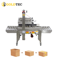 Machine d'emballage de cartons semi-automatique réglable en acier inoxydable Goldtec GTF-5050G avec entraînement latéral
