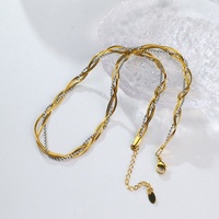 Ensemble collier et bracelet Lincy en acier inoxydable plaqué or 18 carats PVD bicolore, torsadé, en forme de corde, avec chaîne à perles en os de serpent, vente en gros