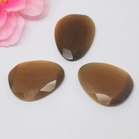 Verre synthétique double face en forme fantaisie œil de chat marron