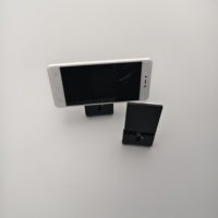 Support d'affichage pour smartphone en acrylique noir, support de téléphone portable pour comptoir avec support arrière pour les magasins de détail, les expositions et les bureaux