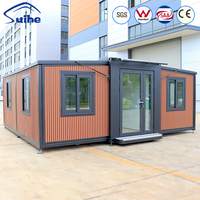 Maison préfabriquée extensible en conteneur de 20 pieds avec panneaux sandwich à double aile et une salle de bain