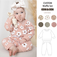 Ensemble de jogging gaufré personnalisé pour bébés et enfants doux et respirant en coton gaufré à imprimé floral pour vêtements d'été pour bébé