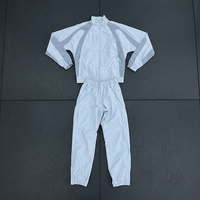 Mode coupe-vent survêtement imperméable coupe-vent deux pièces veste et pantalon ensemble pour la course à pied randonnée et la performance athlétique
