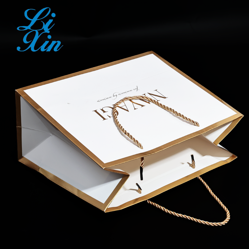 Wholesale Customized Printed Luxury Shopping Gift Cardboard Paper Bag With Handle/luxury Bags Custom Logo