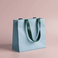 Sac cadeau en papier kraft de luxe bleu avec ruban Logo et taille personnalisables pour la Saint-Valentin Emballage de vêtements et de cadeaux