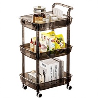Chariot de rangement mobile à trois niveaux en plastique, soigneusement sélectionné, avec roulettes, pour collations, table d'appoint de salon, rangement de cuisine