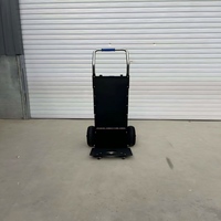 Véhicule électrique supérieur pour la montée d'escaliers capable de transporter sans effort les meubles et les matériaux de construction vers les étages supérieurs