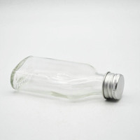 Bouteille en verre sodocalcique de 250 ml en gros, idéale pour les jus de fruits, le lait, le thé et les boissons enzymatiques, avec couvercle en aluminium
