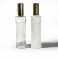 Nouvelle conception de flacon en verre givré cylindrique de 100 ml pour parfum et huiles essentielles, emballage cosmétique, flacon de parfum vide