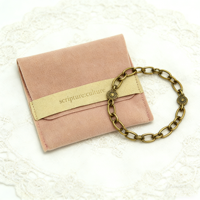 Pochette à bijoux en microfibre de velours imitation daim pêche, imprimée sur mesure avec un motif rayé