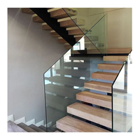 Marches d'escalier modernes en acier et bois massif avec garde-corps en verre pour villa, appartement, hall, usage intérieur et extérieur