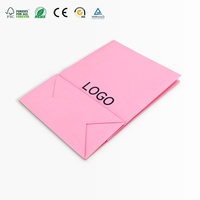 Sac cadeau en papier de luxe avec logo personnalisé imprimé, laminage durable, ruban, sac de shopping réutilisable pour l'emballage de vêtements et de cadeaux