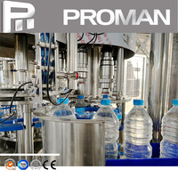 Machine automatique de remplissage et d'embouteillage de bouteilles d'eau minérale Pure