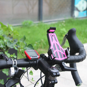 Support de téléphone à trois griffes pour vélo, vélo électrique, moto, antidérapant, en résine plastique rose, avec une adhérence stable - Product Image 1