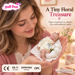 ตุ๊กตาเด็กเกิดใหม่ซิลิโคนขนาด 6 นิ้ว DollDuo แบบสั่งทำพิเศษ ชุดนอนลายดอกไม้สีครีม วาดลายด้วยมือ ของขวัญวันฮาโลวีนสำหรับเด็ก - Product Image 3