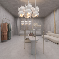 Ropa de moda personalizada, muebles de boutique, estante de exhibición de ropa, Mostrador de isla central de mármol