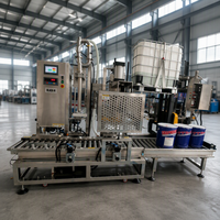 Machine de remplissage automatique à tête unique pour liquides, avec pesage sous le niveau de liquide, pour l'emballage en fûts dans l'industrie alimentaire et chimique