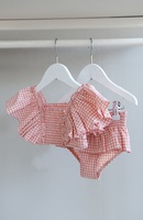 OEM personnalisé 2025 fille deux niveaux jupe à volants et détails de volants maillot de bain pour enfants smocké une pièce maillot de bain fendu fille ensemble de bain