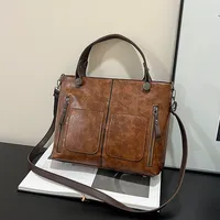 Tas Tote kapasitas besar wanita, tas bahu tunggal mode Eropa dan Amerika, tas Tote Retro untuk wanita, tas selempang sederhana