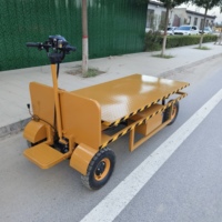 Chariot élévateur à ciseaux électrique motorisé à plateau plat pour la manutention de matériaux en entrepôt et l'utilisation en usine
