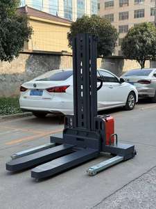 ऑफ-रोड 1500 किलोग्राम स्ट्रैडल लेग फुल इलेक्ट्रिक सेल्फ-लिफ्ट स्टेकर 1.3 मीटर 1.5 मीटर लिफ्ट ऊंचाई बंद पैलेट के लिए - Product Image 5