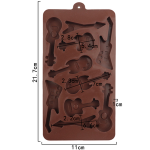 1248 Venta caliente 10 agujeros forma <span class=keywords><strong>de</strong></span> violín todo tipo <span class=keywords><strong>de</strong></span> silicona <span class=keywords><strong>musical</strong></span> molde <span class=keywords><strong>de</strong></span> <span class=keywords><strong>chocolate</strong></span> bandeja <span class=keywords><strong>de</strong></span> hielo molde reutilizable hogar panadero gomoso hacer DIY - Product Image 2