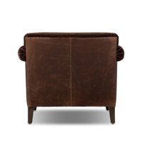 Fauteuil individuel moderne de luxe en velours chocolat avec garniture en cuir, chaise design pour salons haut de gamme et projets de villas
