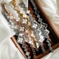Montre-bracelet pour femme 9695 fournie par l'usine, mouvement à quartz, cadran en nacre, affichage à aiguilles, idéale pour les diffusions en direct sur TikTok