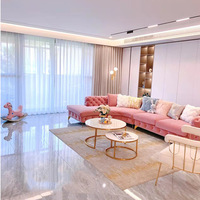 Canapé Chesterfield incurvé en forme de L avec boutons modernes Ensembles de canapés d'angle rembourrés en velours Ensemble de canapés de salon modulaires
