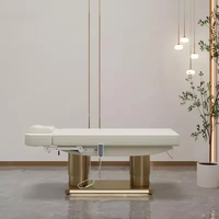 Meubles de salon de beauté de luxe, table de massage à 4 moteurs en PU avec base en métal, lit de spa facial moderne pour la vente