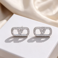 Nouveauté, bijoux de luxe en acier inoxydable entièrement sertis de diamants, marques de créateurs célèbres, collier et boucles d'oreilles en forme de lettre V pour femmes