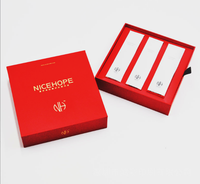 Boîte cadeau magnétique rouge de luxe en gros, boîte d'emballage rigide personnalisée avec séparateurs pour les cosmétiques et les soins de la peau