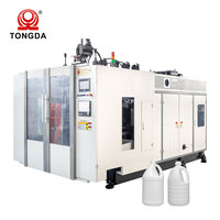 Ligne de production de soufflage hydraulique servo-électrique pour l'extrusion et l'alimentation de bouteilles en plastique HDPE de 2L et 3L pour produits chimiques
