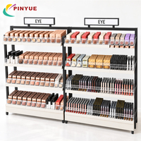 Étagère de présentation de cosmétiques en métal sur pied pour la vente au détail, 5 niveaux, unité d'étagérage commerciale pour maquillage avec plateaux en acrylique pour les magasins de beauté