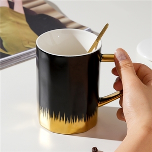 Manufacturer Selling Minimalist Style <b>Ceramic</b> <b>Cup</b> <b>Ceramic</b> Mug with Gold Handle with a Porcelain Lid and a Golden Spoon - Product Image 5