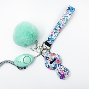 Set de Llavero de Defensa Personal para Tiktok e Instagram, con Desinfectante, Porta Brillo Labial, Alarma Sonora, Luz LED y Pompón - Set de 4 Piezas - Product Image 2