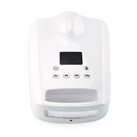Sèche-ongles LED UV blanc avec écran numérique monté sur le dessus et quatre boutons de minuterie pour usage en salon