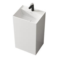 Lavabo sur pied en céramique intégré avec support de robinet monotrou, design moderne pour salle de bain