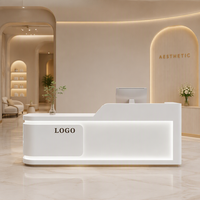 Comptoir de réception minimaliste incurvé avec éclairage LED pour salon de beauté de luxe, clinique de spa, boutique, magasin, bureau