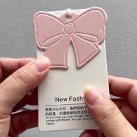 Etiquetas de precio de papel con forma de lazo rosa personalizadas al por mayor para ropa, etiquetas impermeables para ropa de moda, código de barras para zapatos Boutique