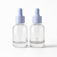 Flacon compte-gouttes en verre transparent à épaules rondes et fond épais, avec nouvelle pipette marquée pour échantillons d'essences, sérums cosmétiques