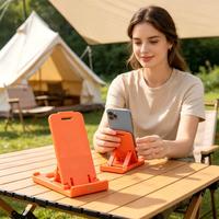 Support de téléphone de bureau pliable et réglable en ABS imperméable pour toutes les tablettes et téléphones mobiles, design mini portable, option de logo personnalisé