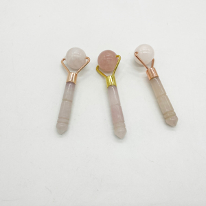 Rodillo de masaje facial al por mayor, masajeador facial de cristal natural con logotipo personalizado con caja, rodillo de cuarzo rosa de alta calidad - Product Image 1