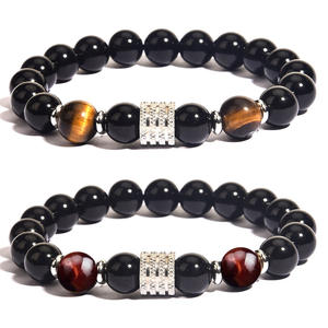 Vente en gros de nouveaux bijoux Oeil de tigre Bracelet de perles noires brillantes, Bracelet perlé universel en acier inoxydable pour hommes et femmes - Product Image 1