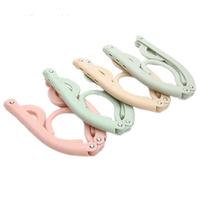 Cintres pliables portables en plastique pour organiser les vêtements et gagner de la place en voyage