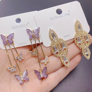 Les boucles d'oreilles diamant et perle de luxe léger sont à la mode et polyvalentes. Les boucles d'oreilles de style français sont plaquées d'or véritable - Product Image 3